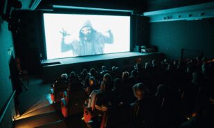 People Watching Movie on a Cinema