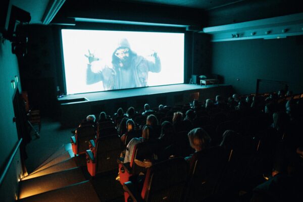 People Watching Movie on a Cinema