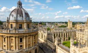 An outside shot of Bodleian Library at Oxford University on a sunny day with partly cloudy sky