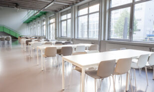 an dining room has an open space for the use of your dishes with table and chairs