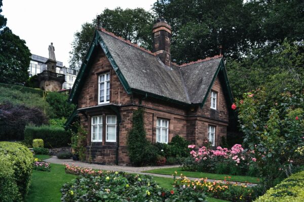 brown and white concrete house in Princes Street Gardens, Edinburgh, UK