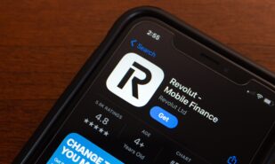 The Revolut app is displayed in the App Store on an iPhone. Revolut is a global neobank and financial technology company headquartered in London, UK