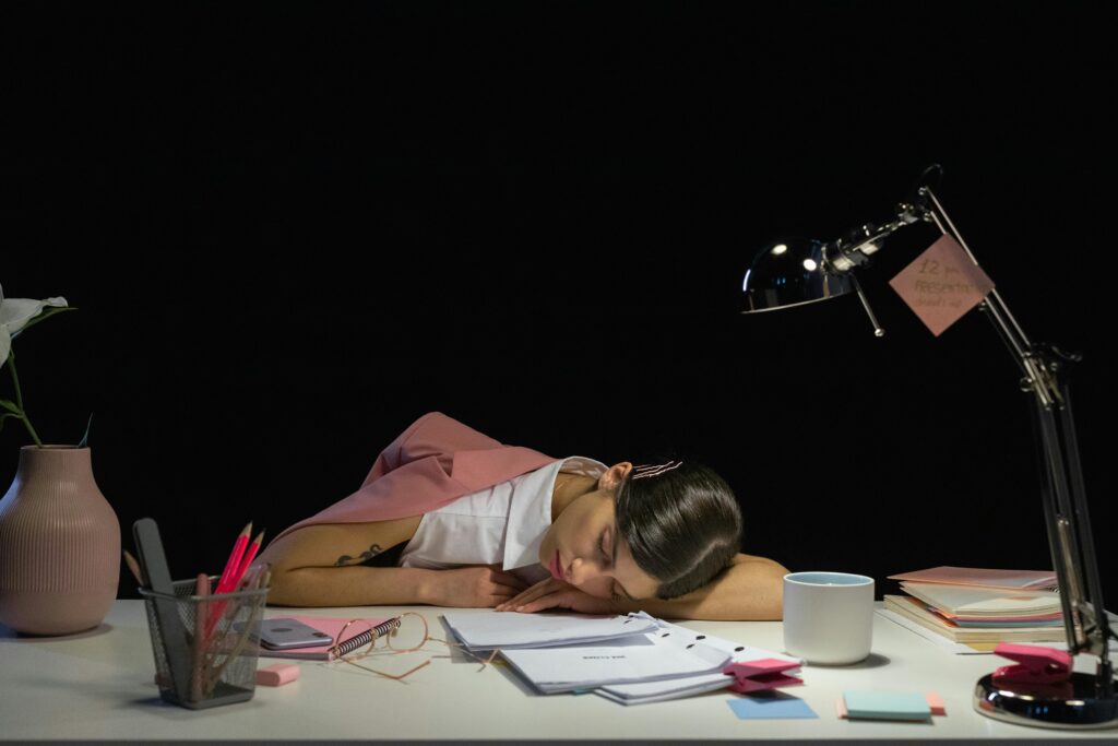 Woman Sleeping on Desk