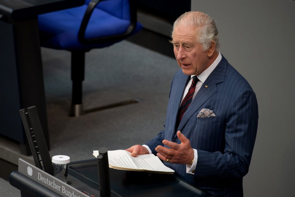 close up portrait of King Charles III. during his speech at the Bundestag on occasion of the British State Visit - he makes an explaining gesture with his hand