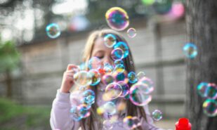 kids bubbles girl human female child kid outdoors bubble play