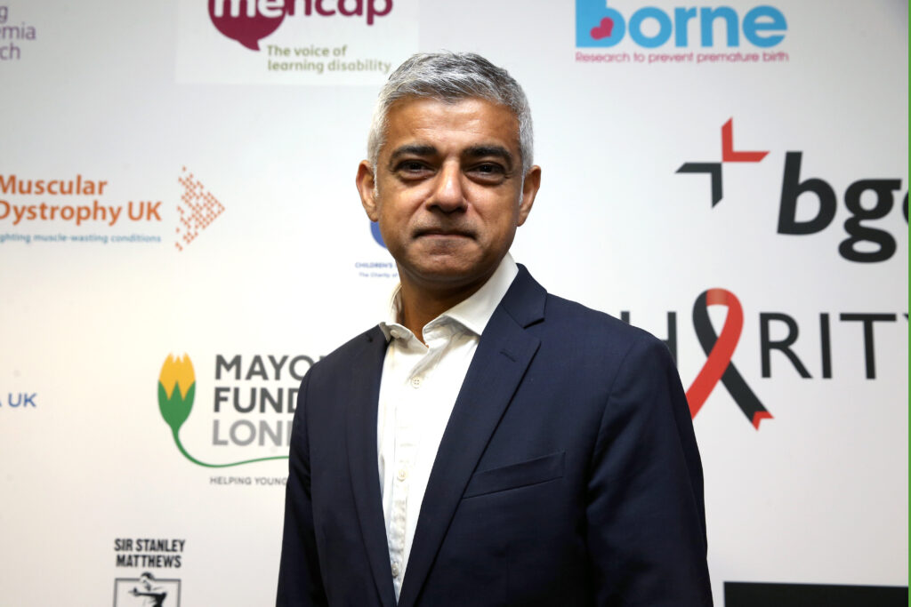 Khan attends BGC Charity Day at One Churchill Place on September 2019