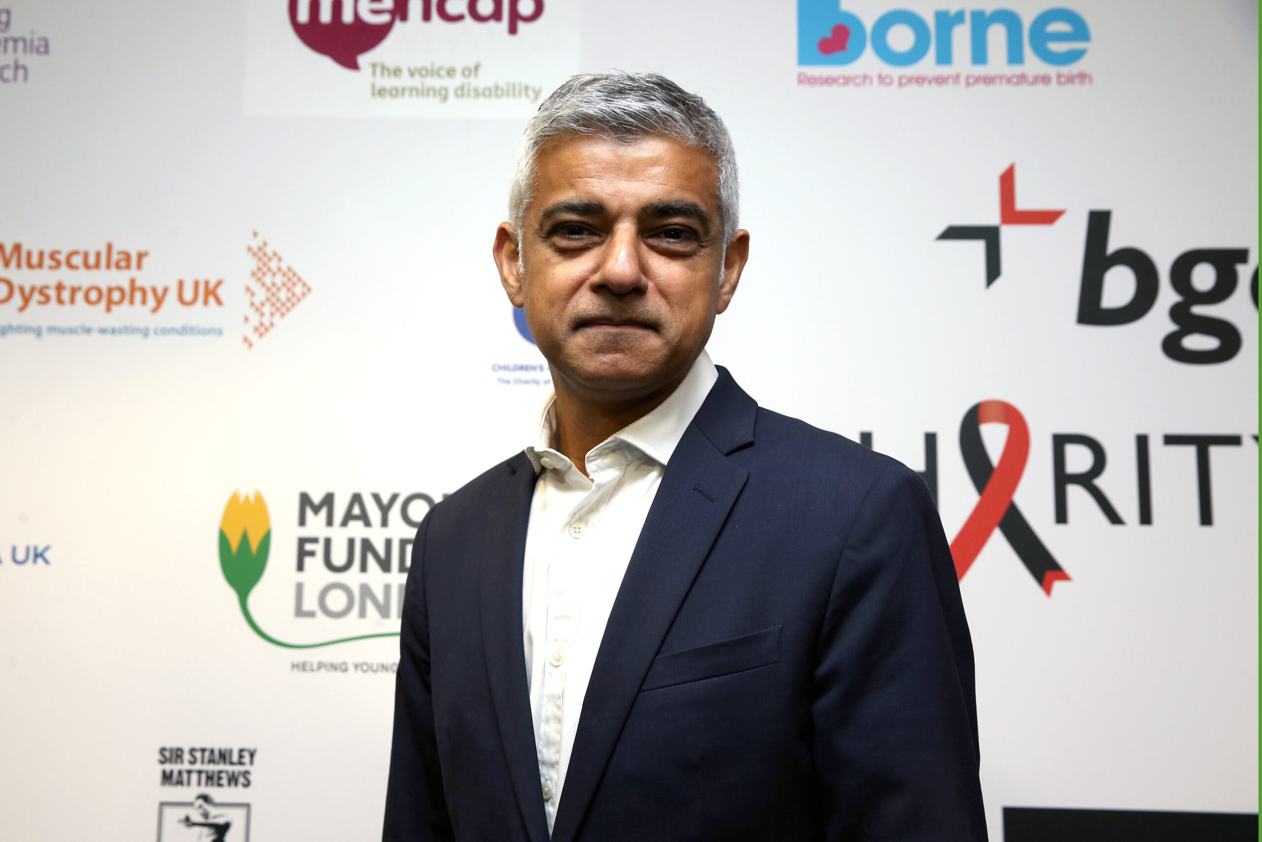 Khan attends BGC Charity Day at One Churchill Place on September 2019