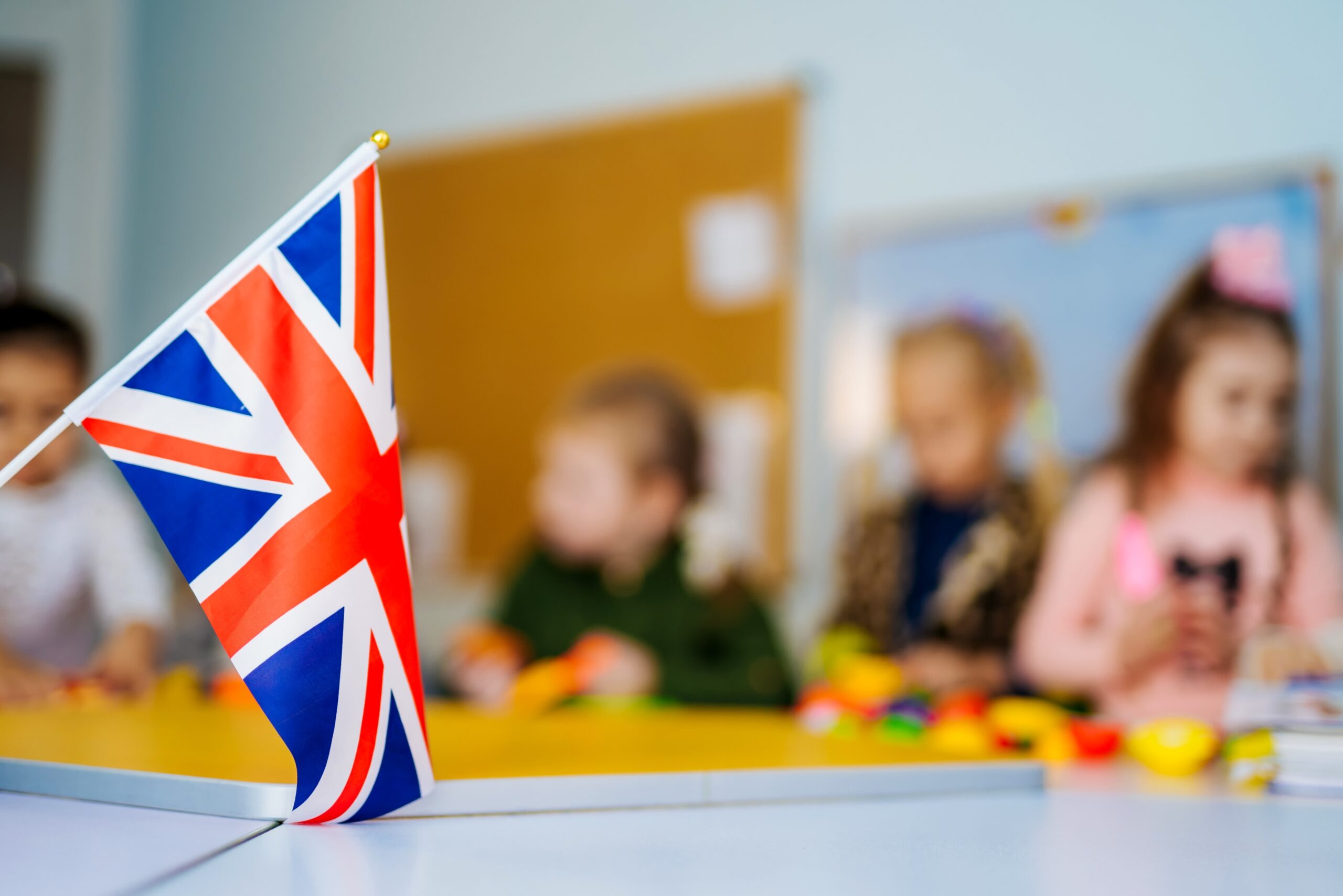 Learn English School Children. Education in the United Kingdom. Flag of Great Britain.