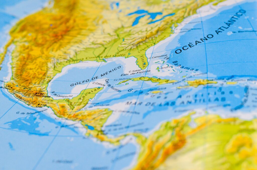 A world map is a graphic representation of the Earth on a plane, showing the globe divided into two projected hemispheres. The word "world map" comes from the medieval Latin mappa mundi, meaning "map