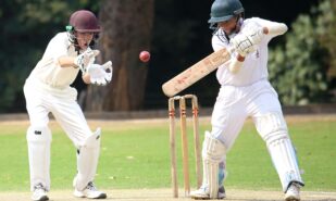 Boys Playing Cricket