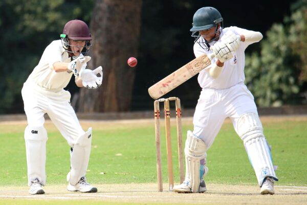 Boys Playing Cricket