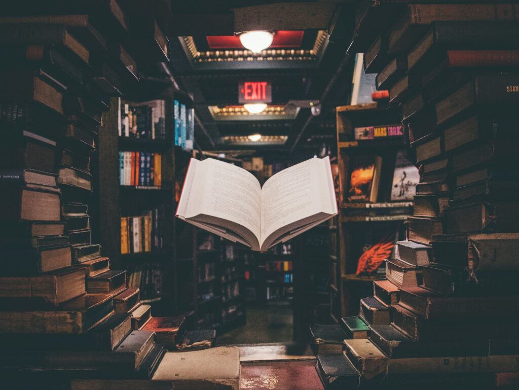 A book floating in between other books