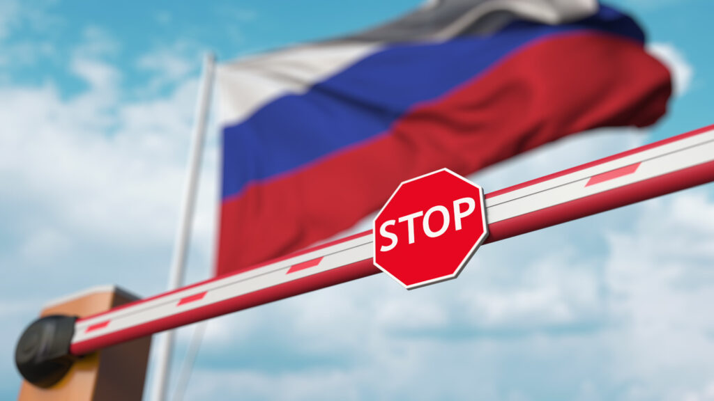 Barrier gate being closed with flag of Russia as a background. Russian restricted entry or certain ban. 3D rendering
