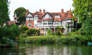 Castle-like building in a greenery on the River Themes near England