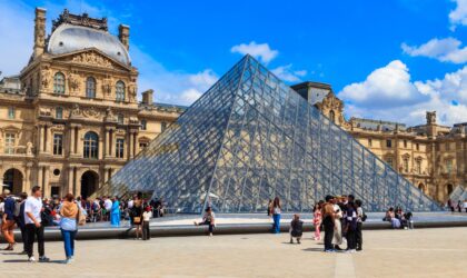 Museum of Louvre and pyramids in Paris, France