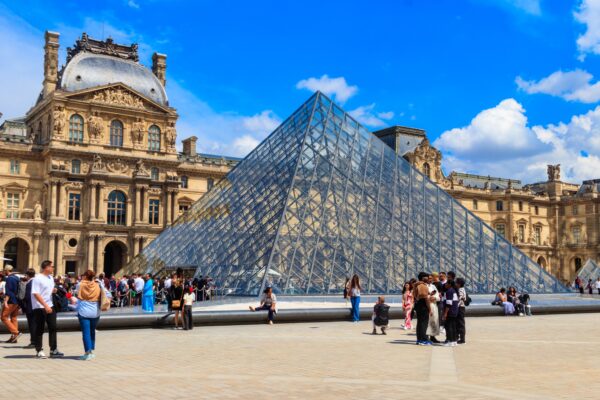 Museum of Louvre and pyramids in Paris, France