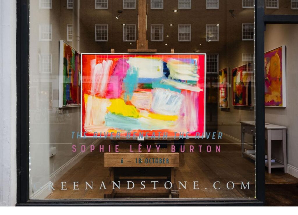 Sophie Lévy Burton's painting Praying in the window of Greene and Stone's Gallery