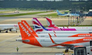 Row of planes of different airlines at London Gatwick Airport