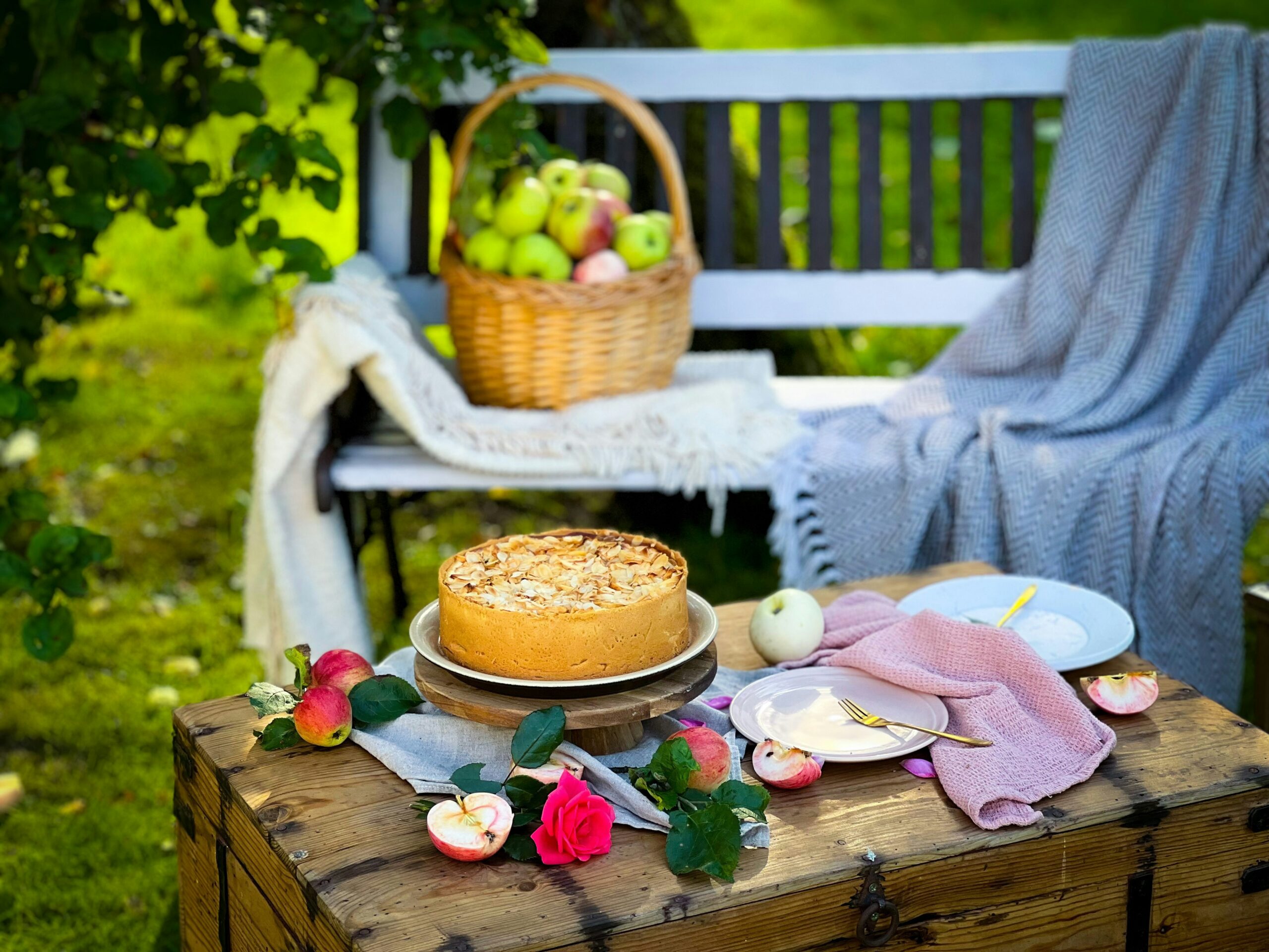 apple pie, basket of apples, bench, outside, picnic