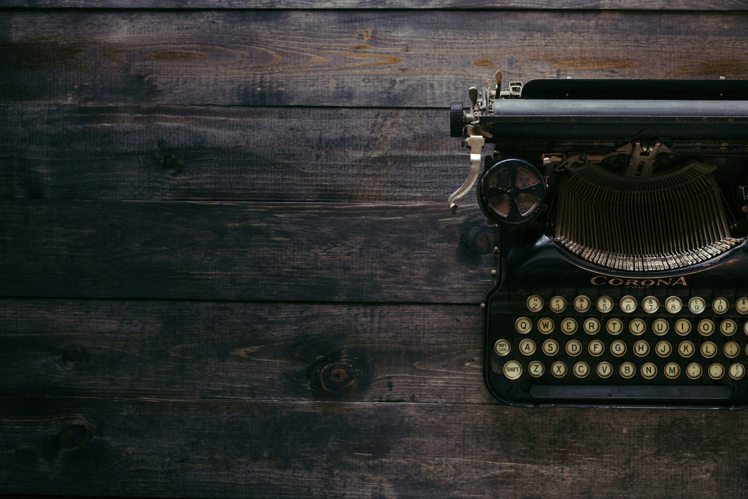 typewriter on wooden table