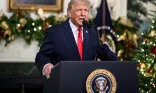 President Donald Trump addresses the nation on Wednesday from the reception hall of the White House diplomatic representatives.