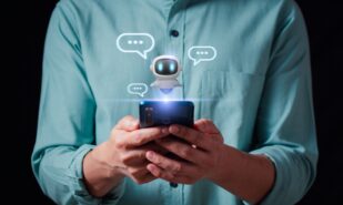 Person using a smartphone to interact with a friendly AI chatbot, and digital chatbot are assistant conversation for provide access to data growth of business in online network.