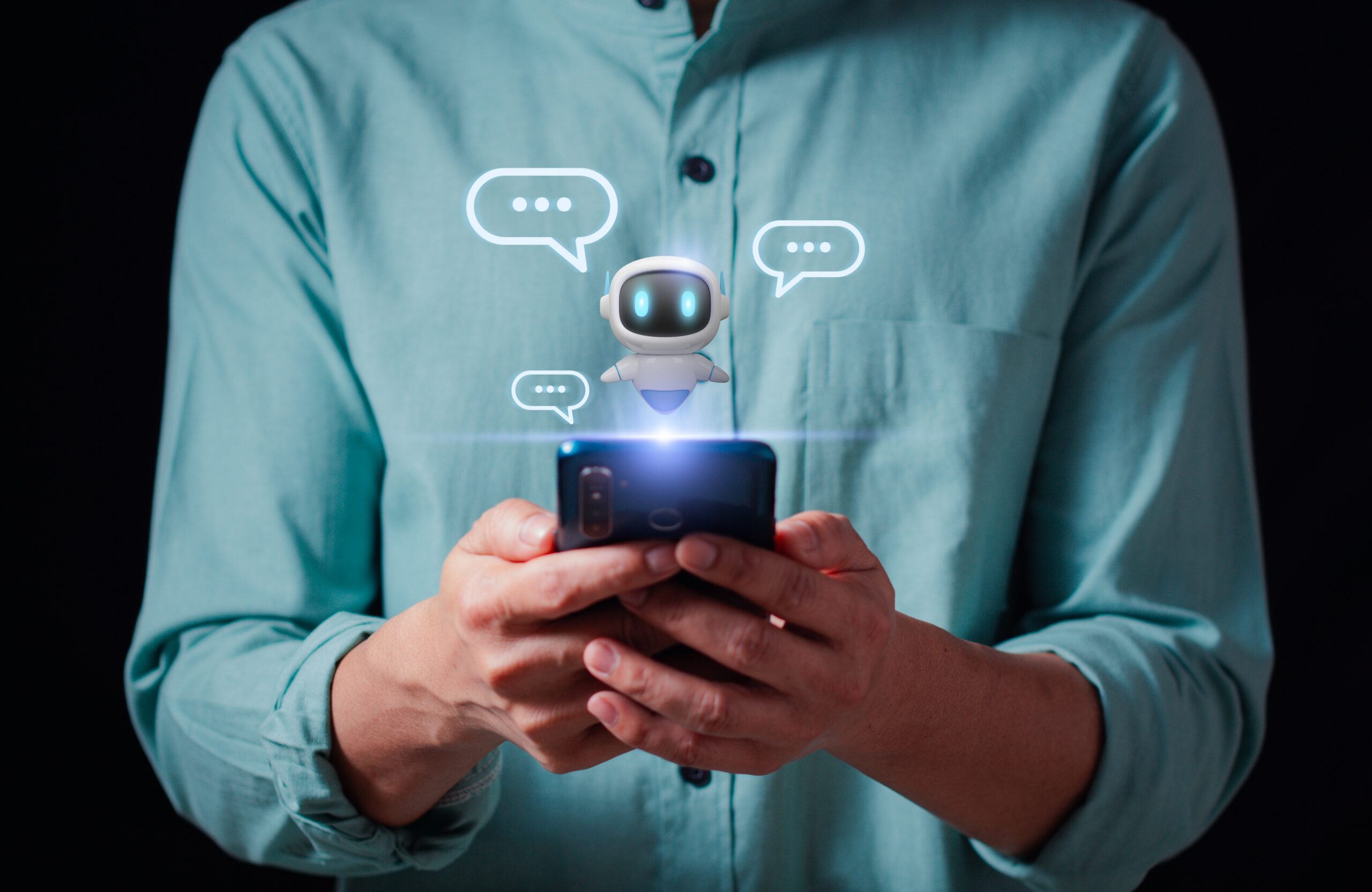 Person using a smartphone to interact with a friendly AI chatbot, and digital chatbot are assistant conversation for provide access to data growth of business in online network.