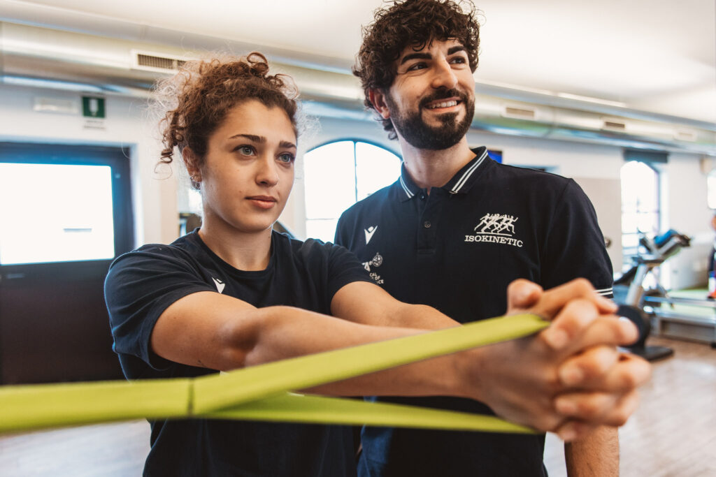 woman exercising with coach