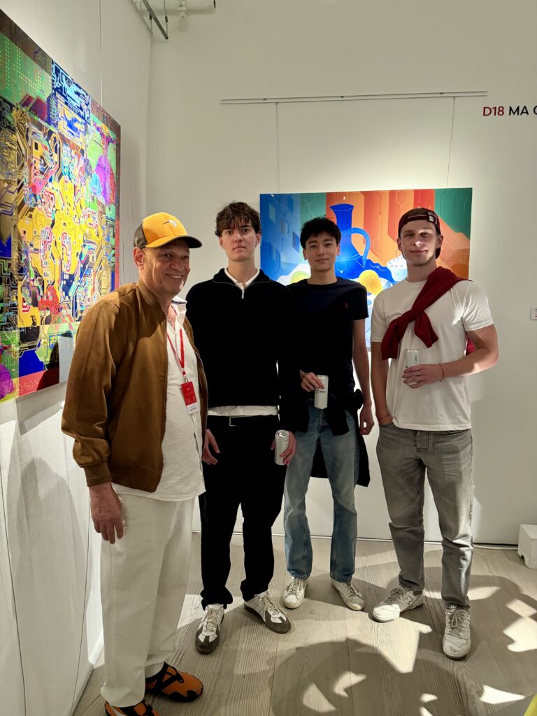 people standing in front of painting at exhibition